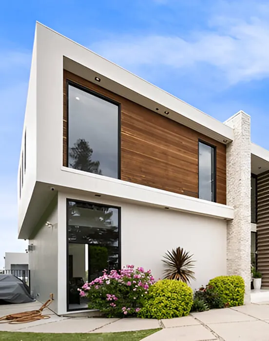 Contemporary villa with timber cladding and a landscaped garden